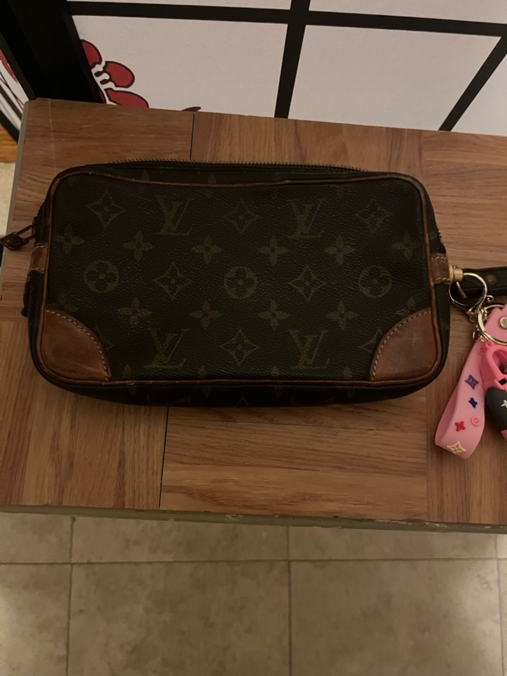 Louis Vuitton Brown Monogram Clutch with Pink Charm - Picture 4 of 13